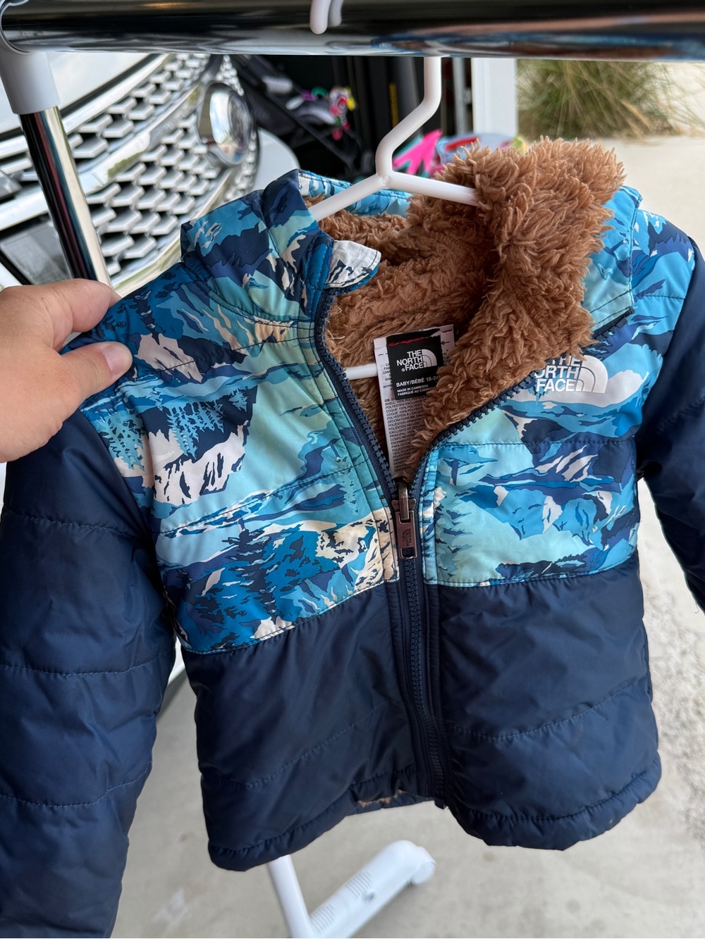 The North Face Kids Navy Jacket with Blue Camo Panels and Brown Faux-Fur